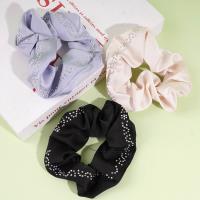 Satin embroidered sequins with floral patterns on the hem of a skirt