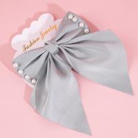 Milk coffee, studded pearls, fluttering ribbons, and duck-shaped clips