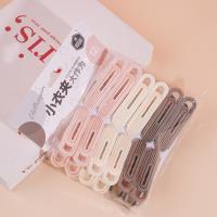 مشابك الملابس الأنيقة HY-1677 بمقدار 12 قطعة.