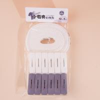 La corde à sécher HY-1307 + 12 pinces.