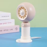 The YM88218 cream-colored pop-up fan with a lanyard-equipped base