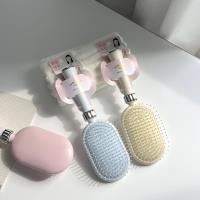 Le peigne à airbag TD-1110 au style minimaliste et sophistiqué.