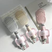 La peigne ajournée au style minimaliste TD-1111