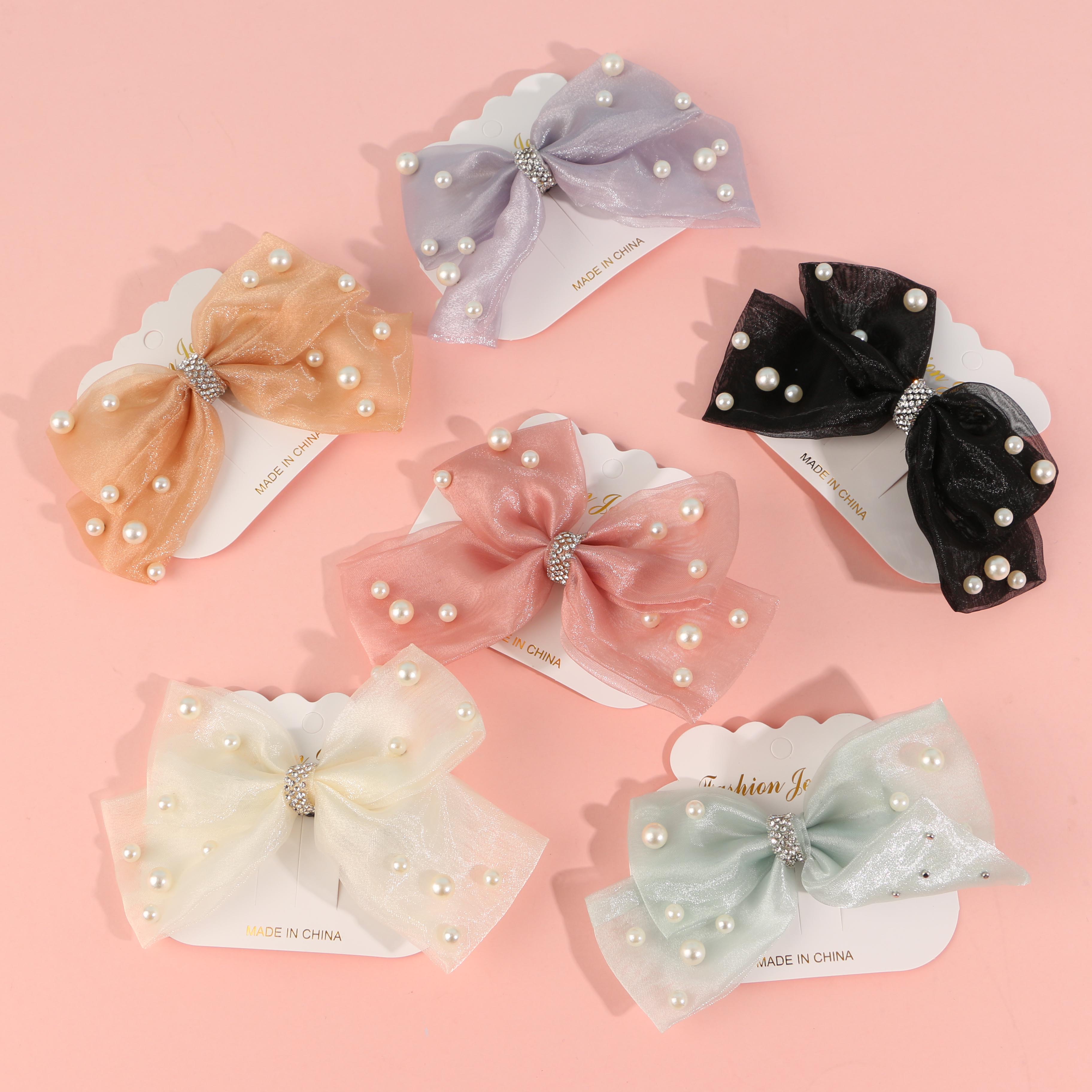 Net lace-embroidered bow tie duck clip