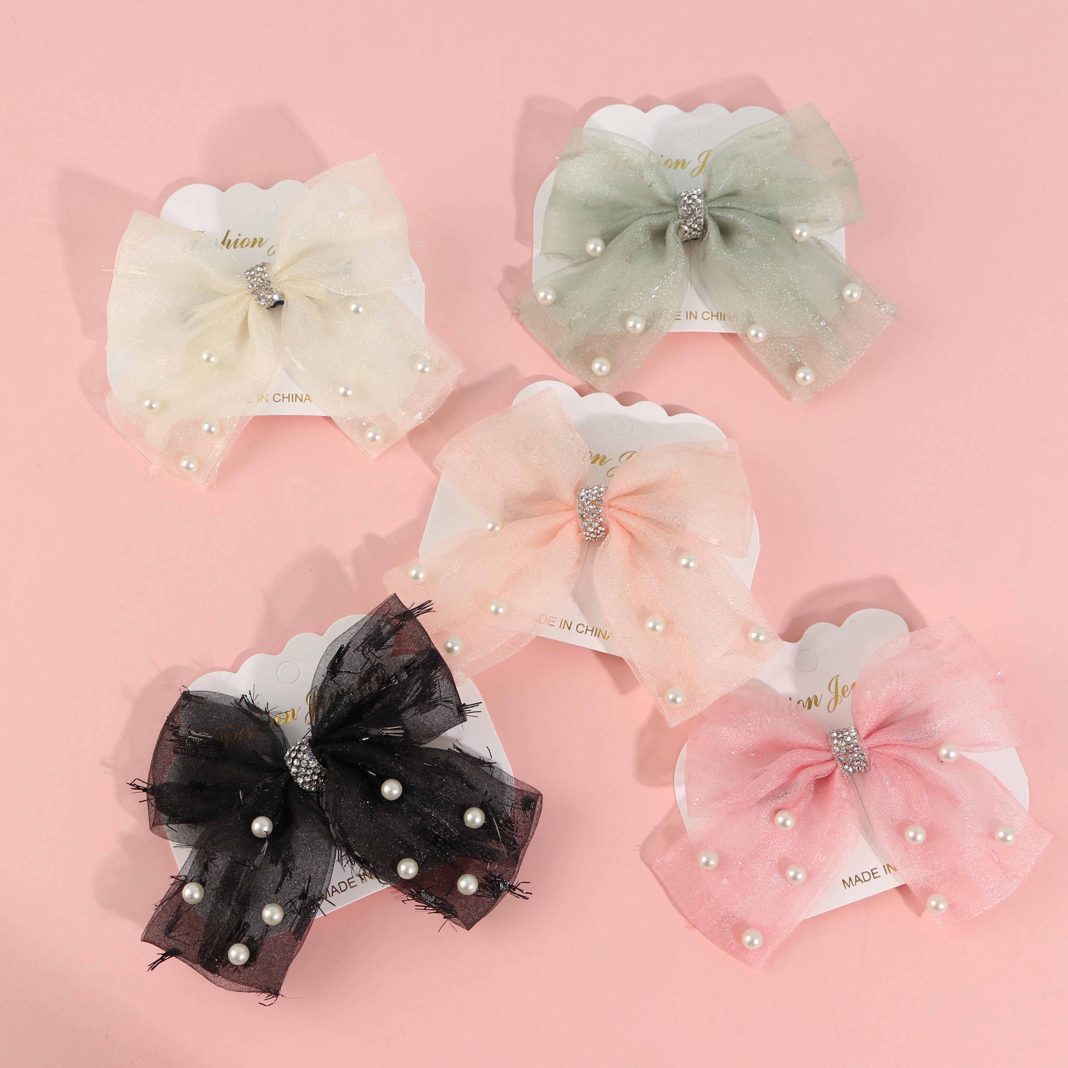 Glitter and beaded bow tie duck clip