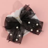 Glitter and beaded bow tie duck clip