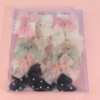 Glitter and beaded bow tie duck clip