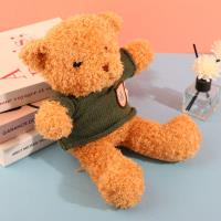 ألعاب محشوة من الدببة على شكل قميص من الأعشاب البحرية.