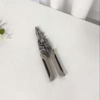 Metal-colored pliers and other tools