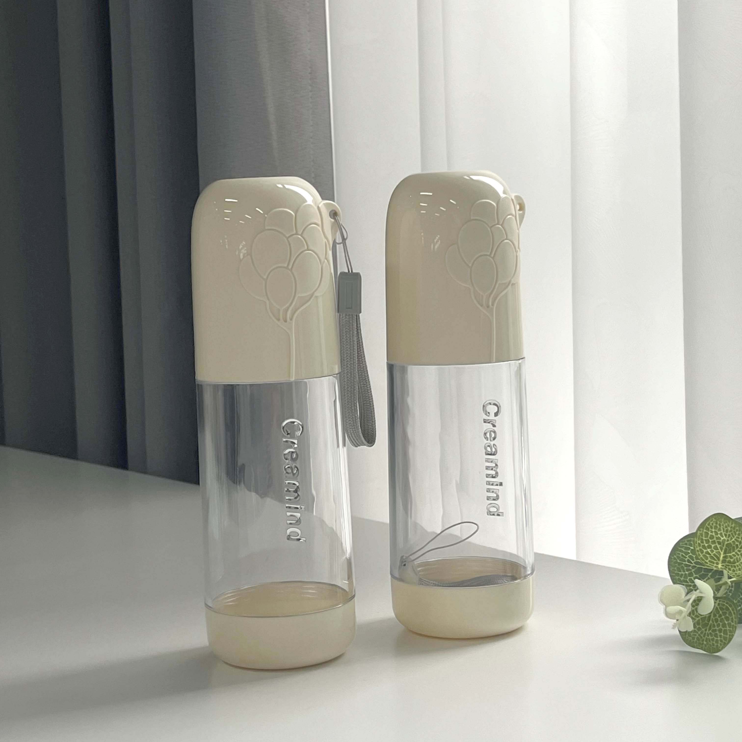 صندوق تخزين أسنان Y-8581 ذو لون كريمي وشفاف.