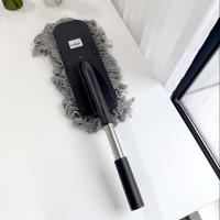 مكنسة ذات مقبض مستقيم.