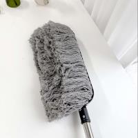 مكنسة ذات مقبض مستقيم.