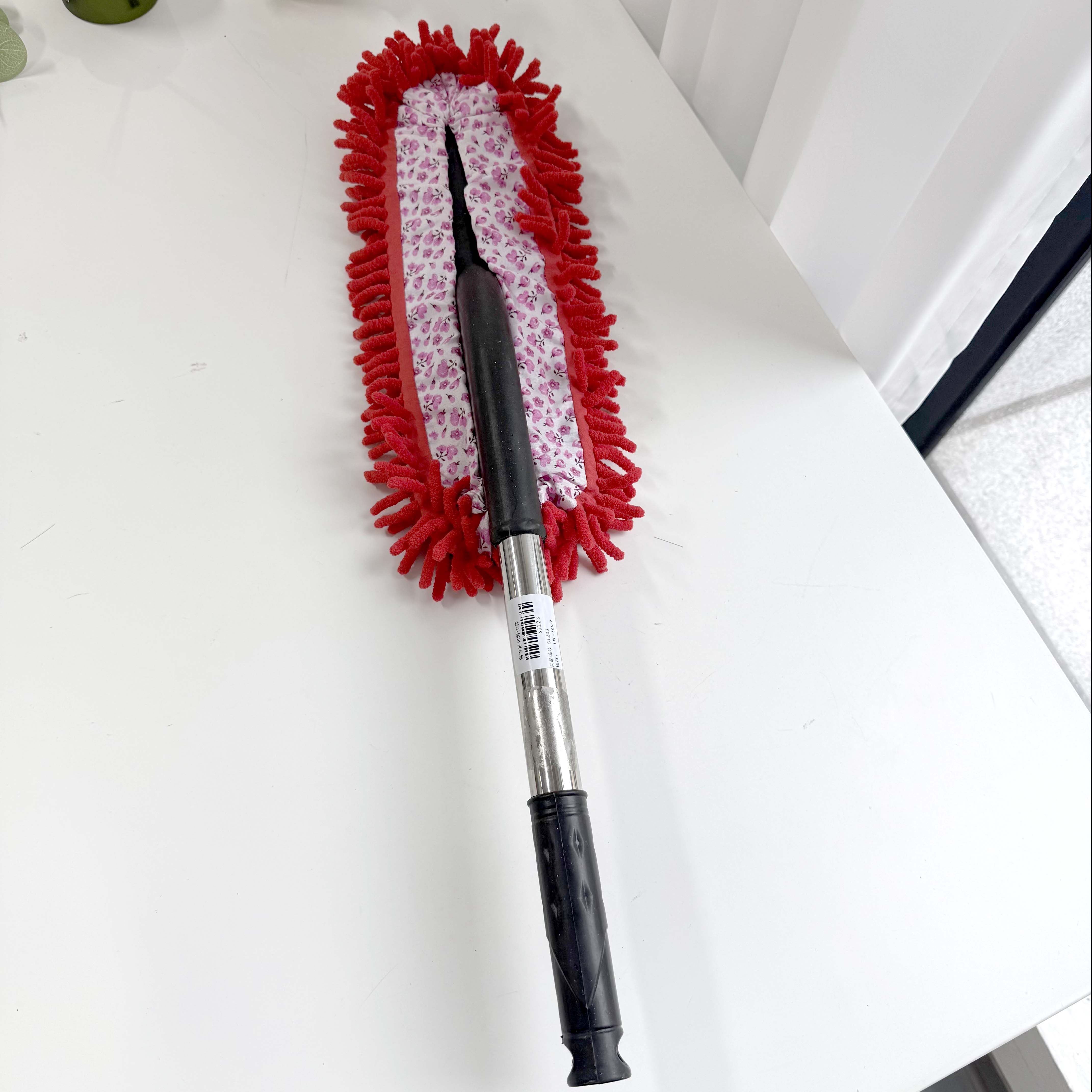 A flat microfiber dusting duster