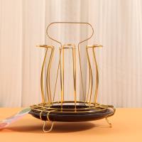 Le porte-gobelets rond à six compartiments 8611 avec poignée.