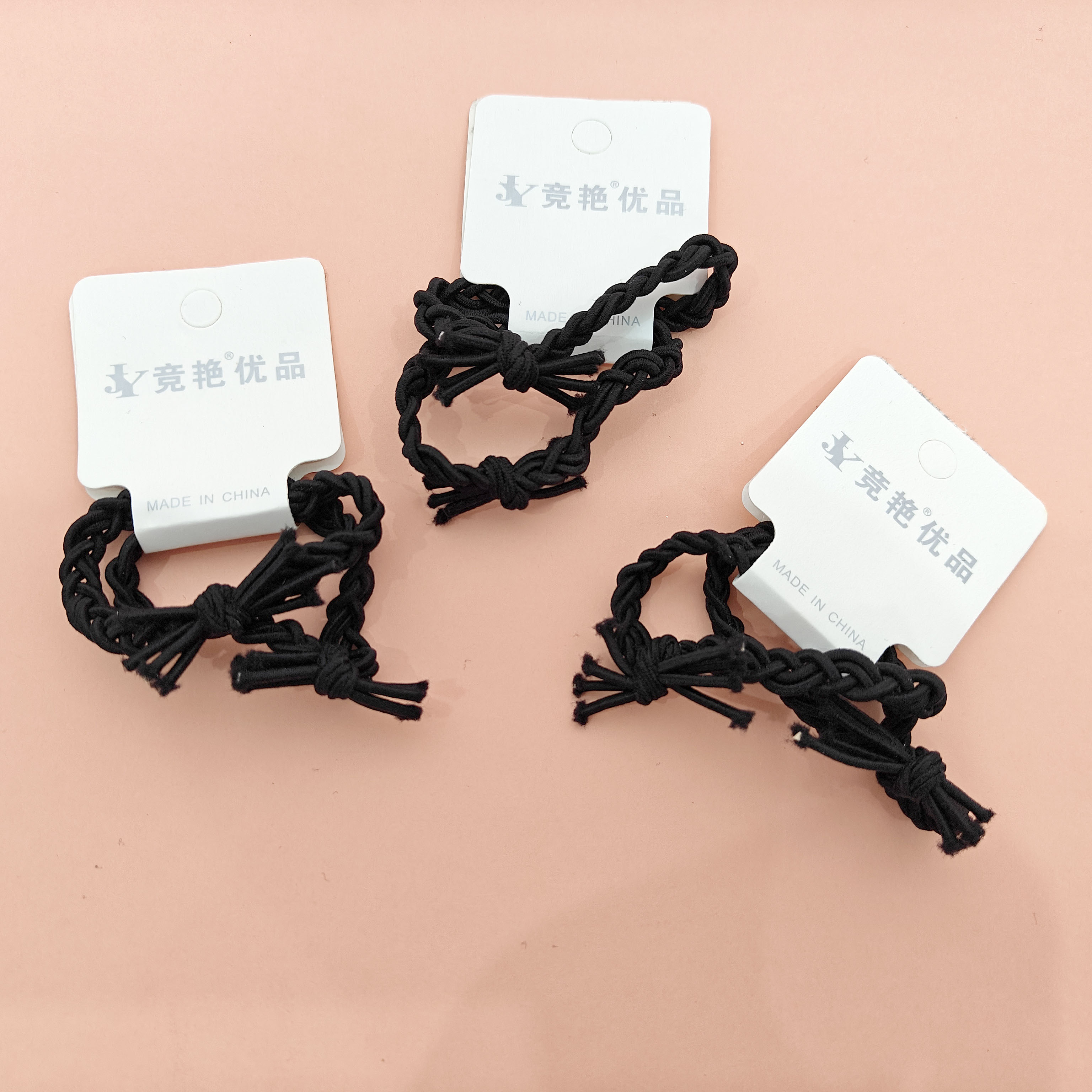 2 black braided headbands