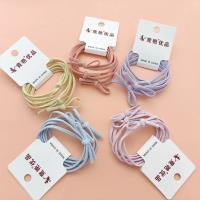 3 headbands decorated with colorful letter bows