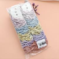 3 headbands decorated with colorful letter bows