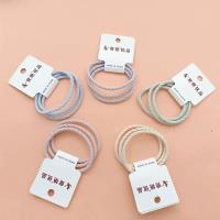 3 colorful screw-style hair ties