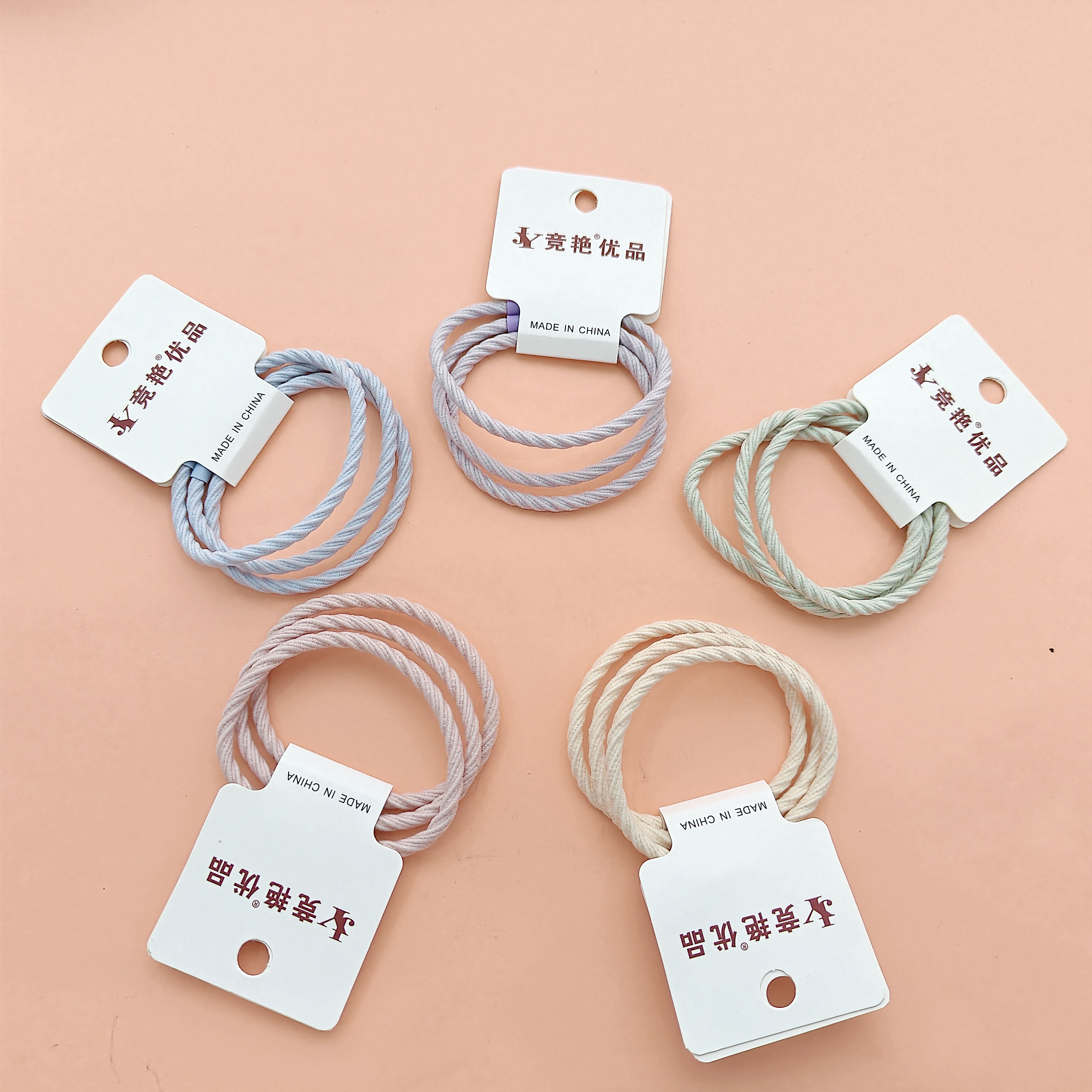 3 colorful screw-style hair ties