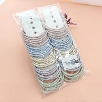 3 colorful screw-style hair ties