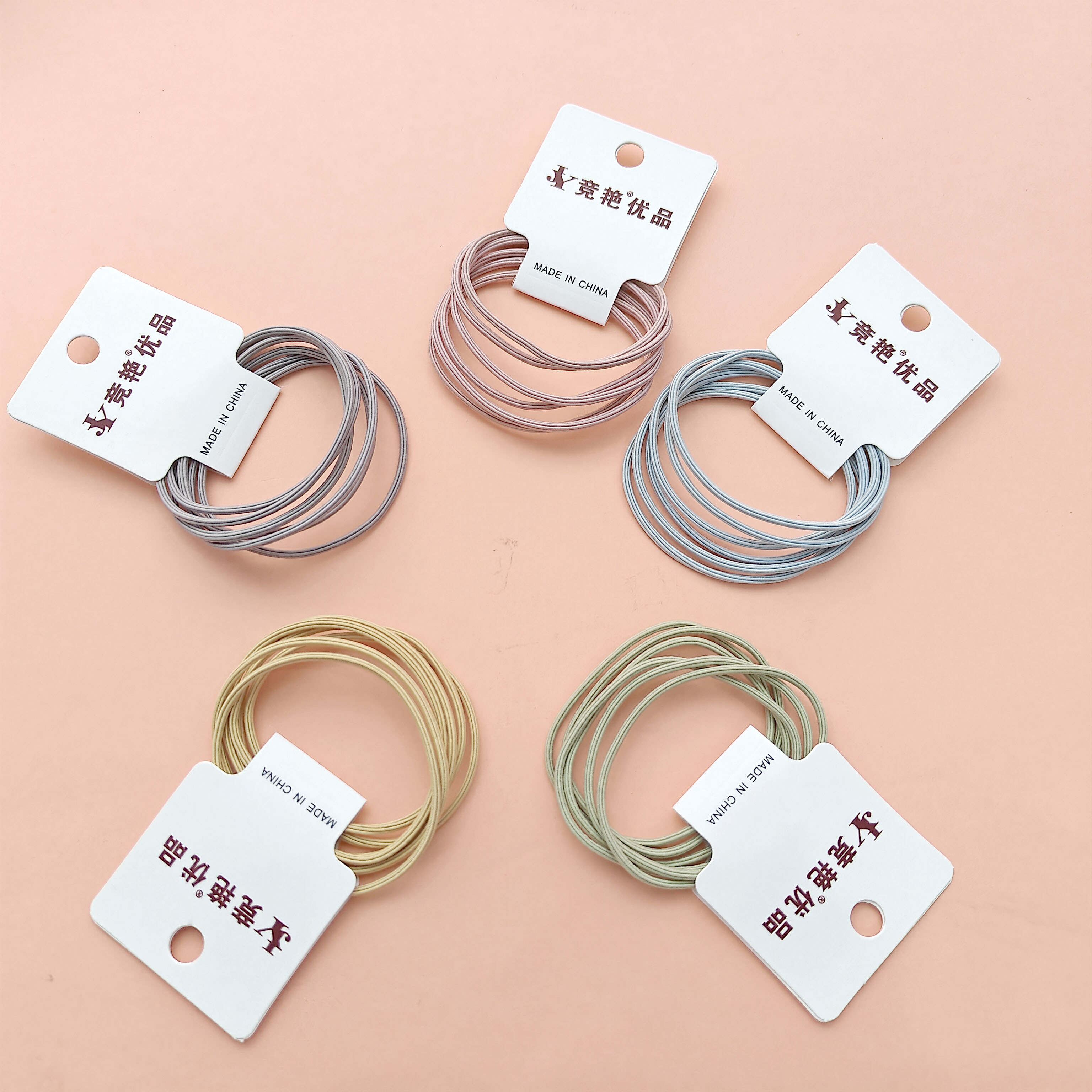 3 colorful sleeve-style hair ties with a fresh and simple design