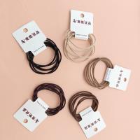 3 black-brown sheath-style hair ties with a simple and fresh design
