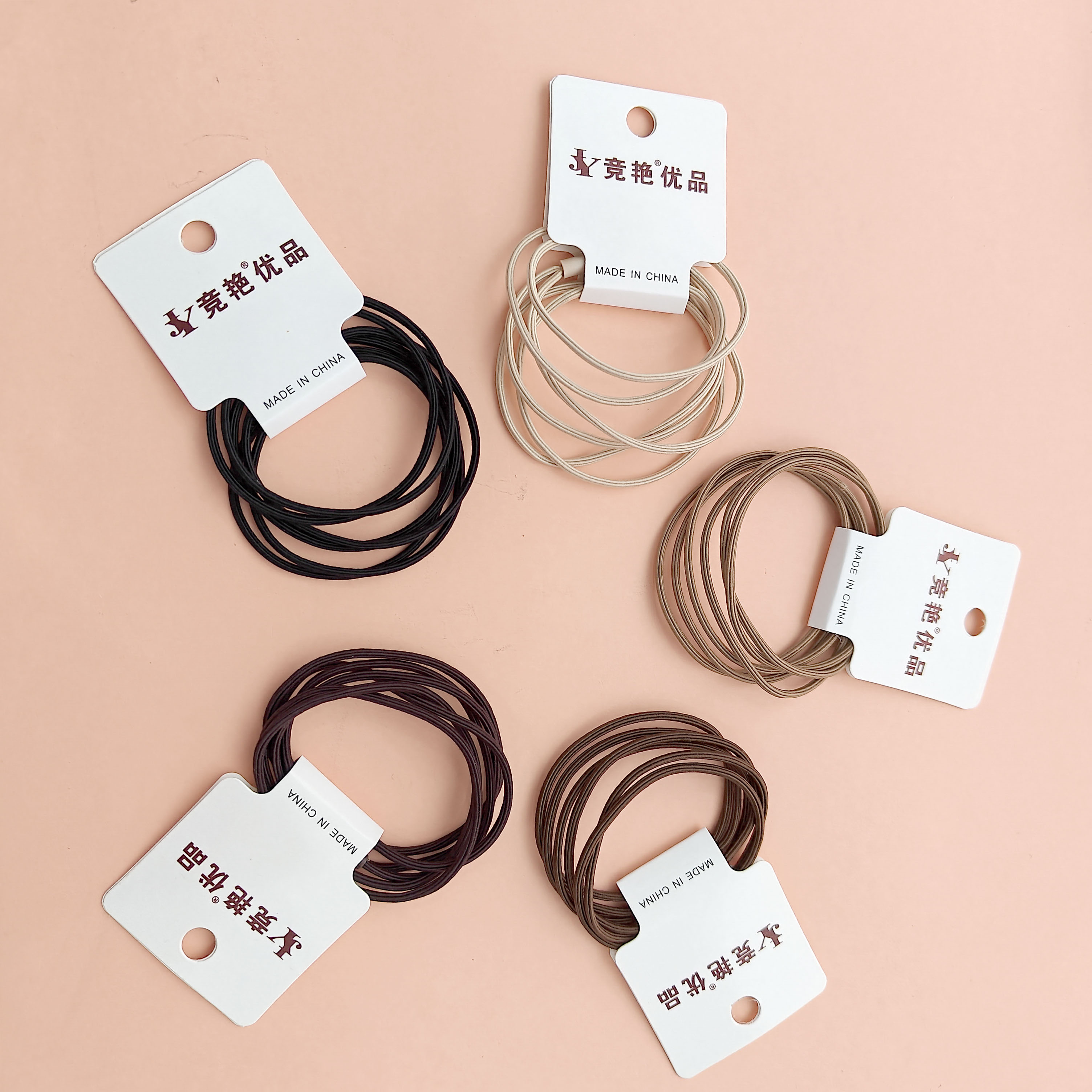 3 black-brown sheath-style hair ties with a simple and fresh design