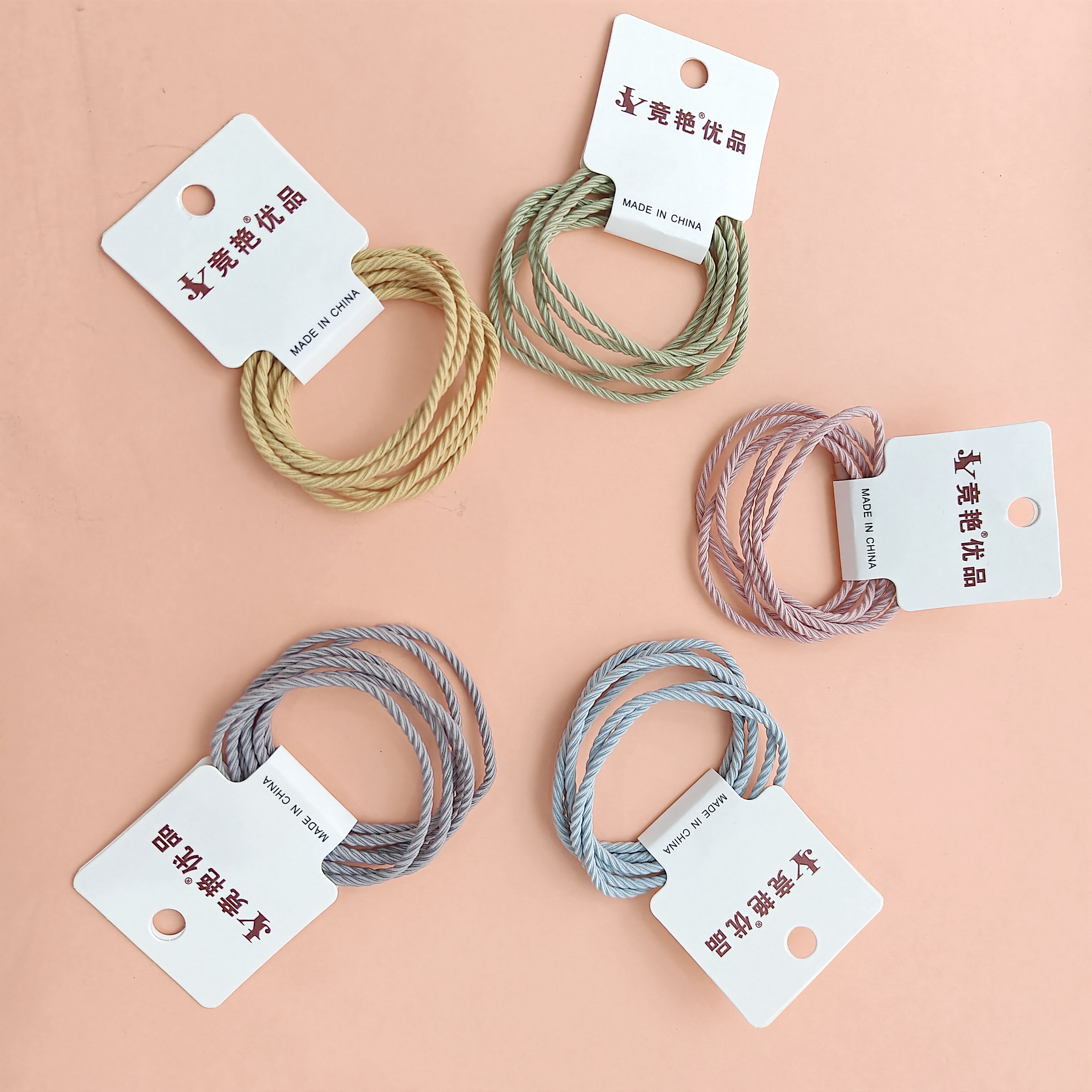 3 small colorful elastic bands with fine threads