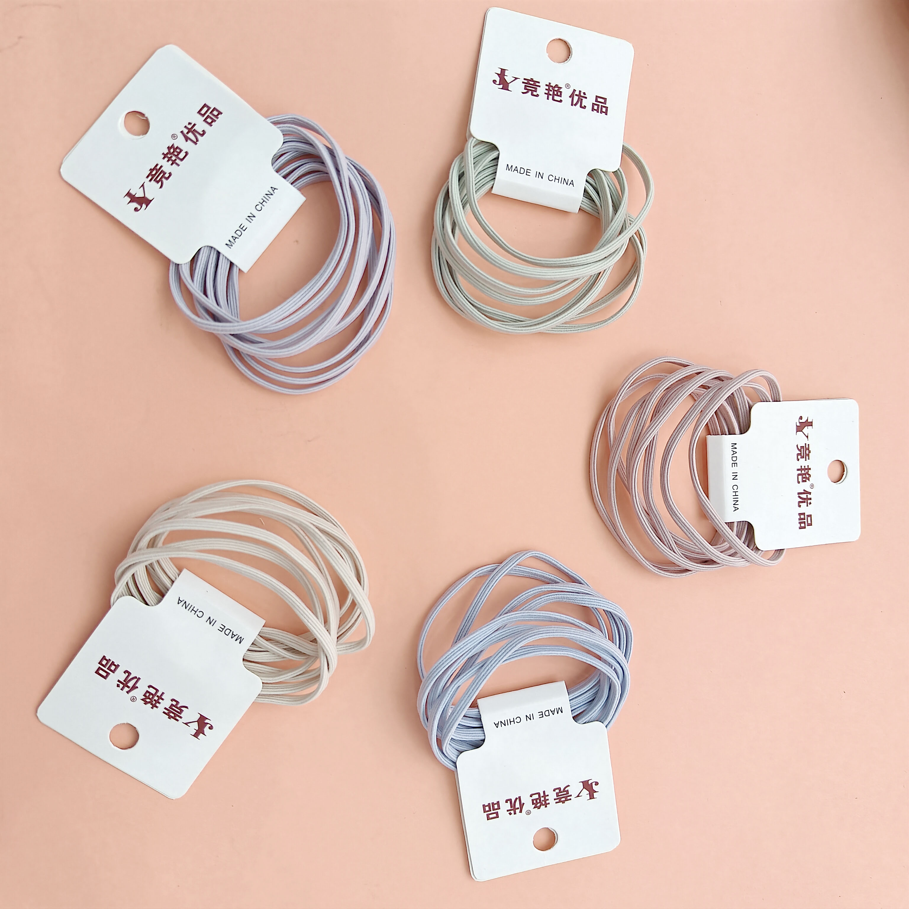 4 pieces of light-colored sleeve-headed ropes