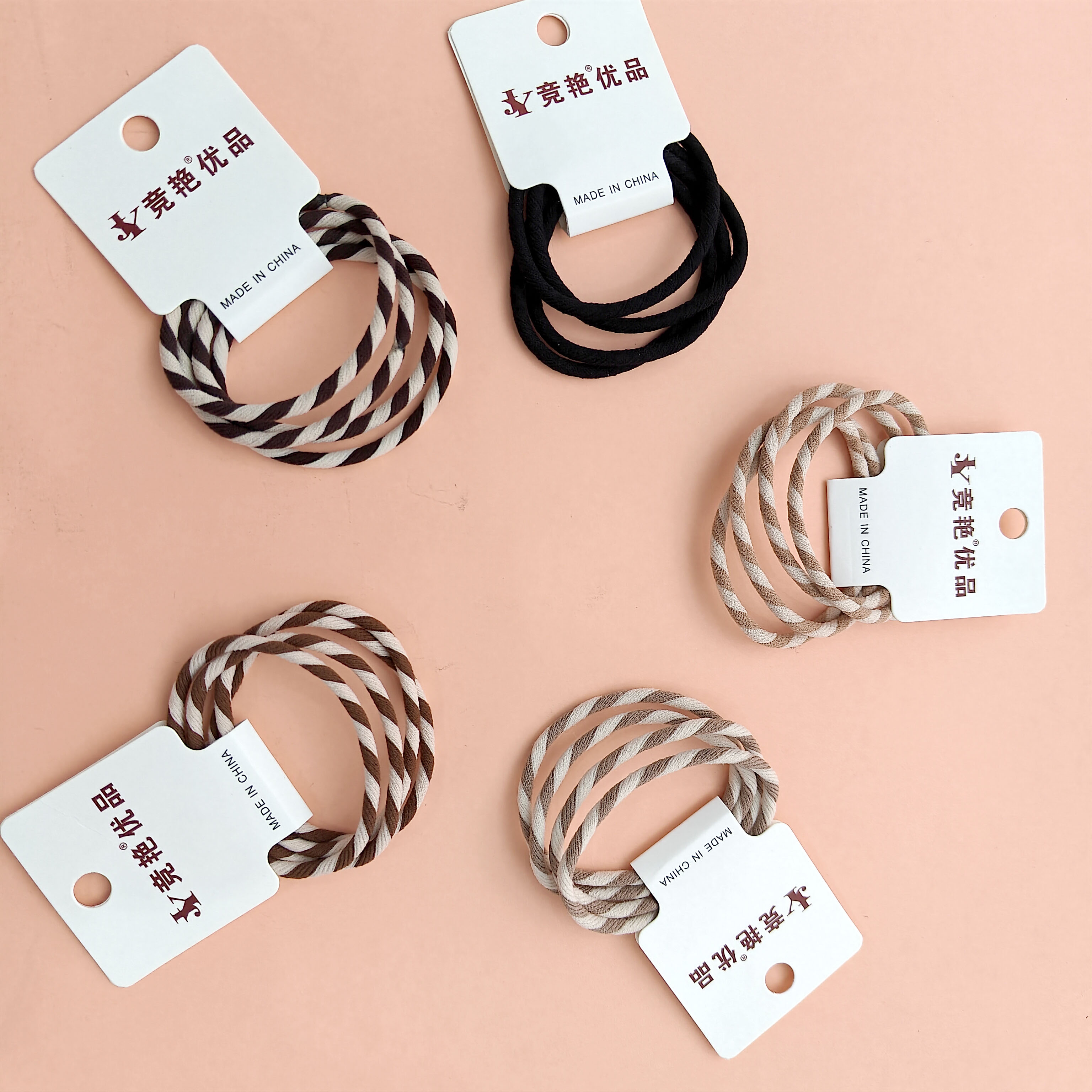 4 large-sized, earth-toned wave-patterned hair ties