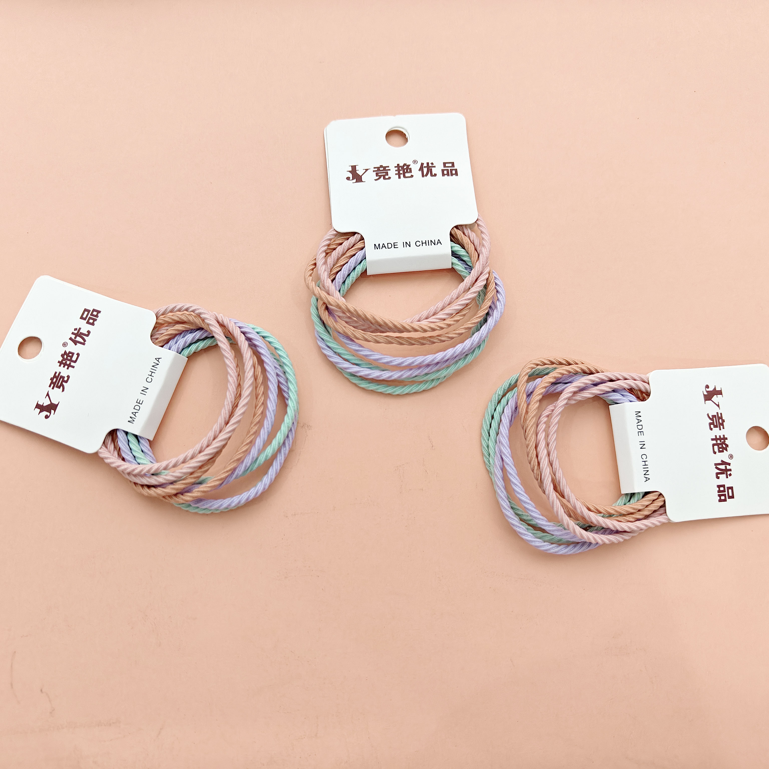 8 candy-colored screw-shaped ponytail holders