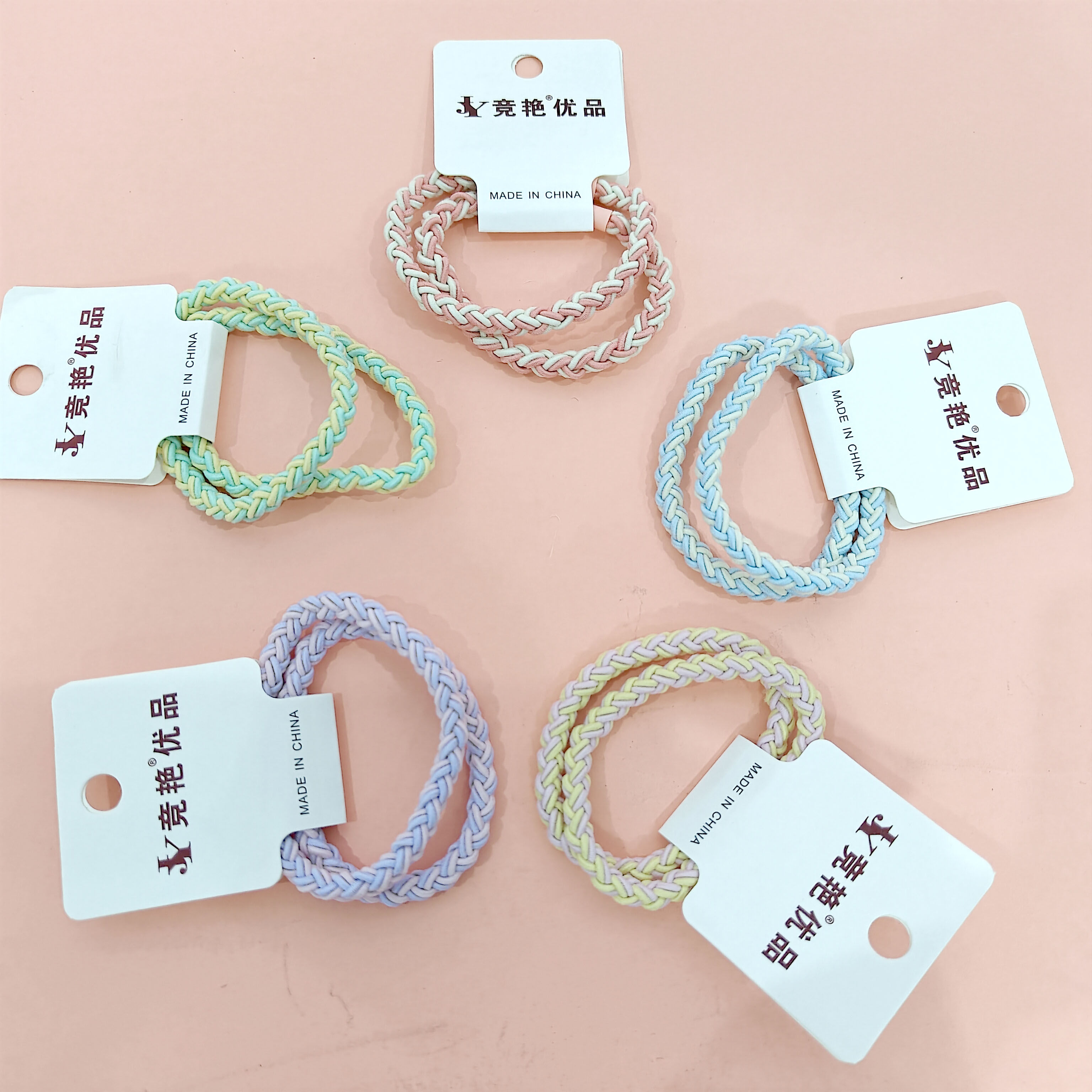 2 candy-colored pretzel-shaped braided headbands