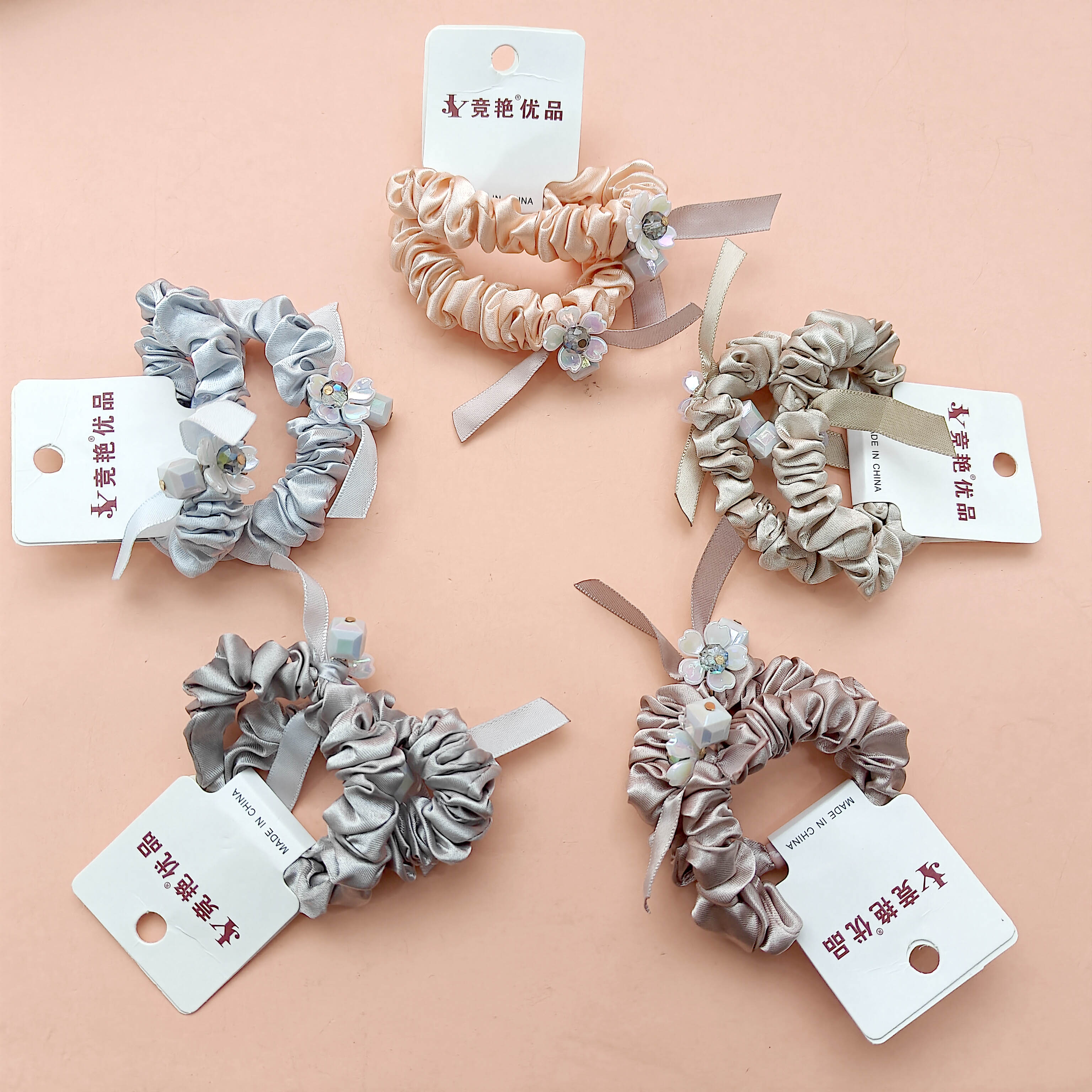 2 delicate small bowls made of crystal flowers and ribbons for tying hair