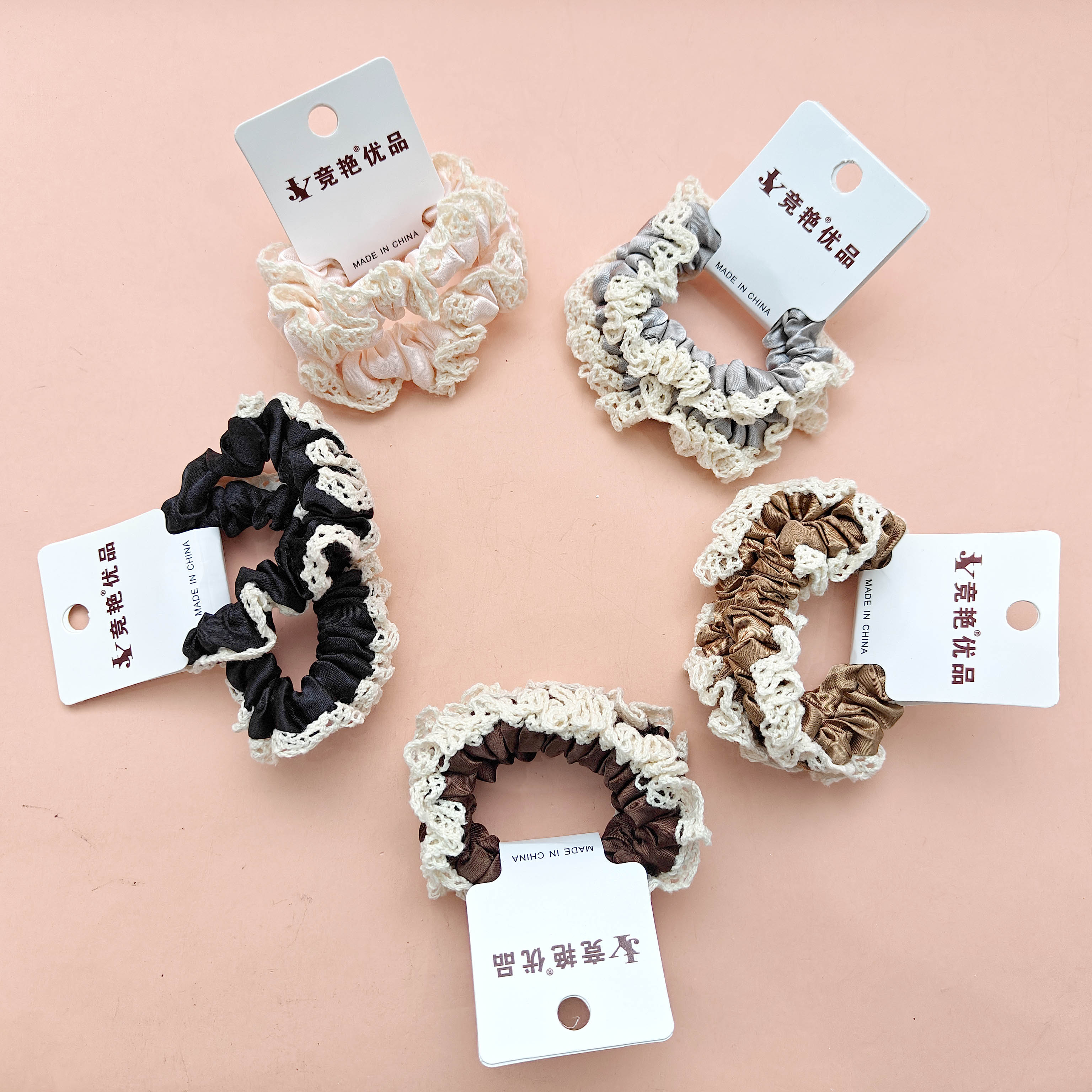 2 hollow-out lace hair ties