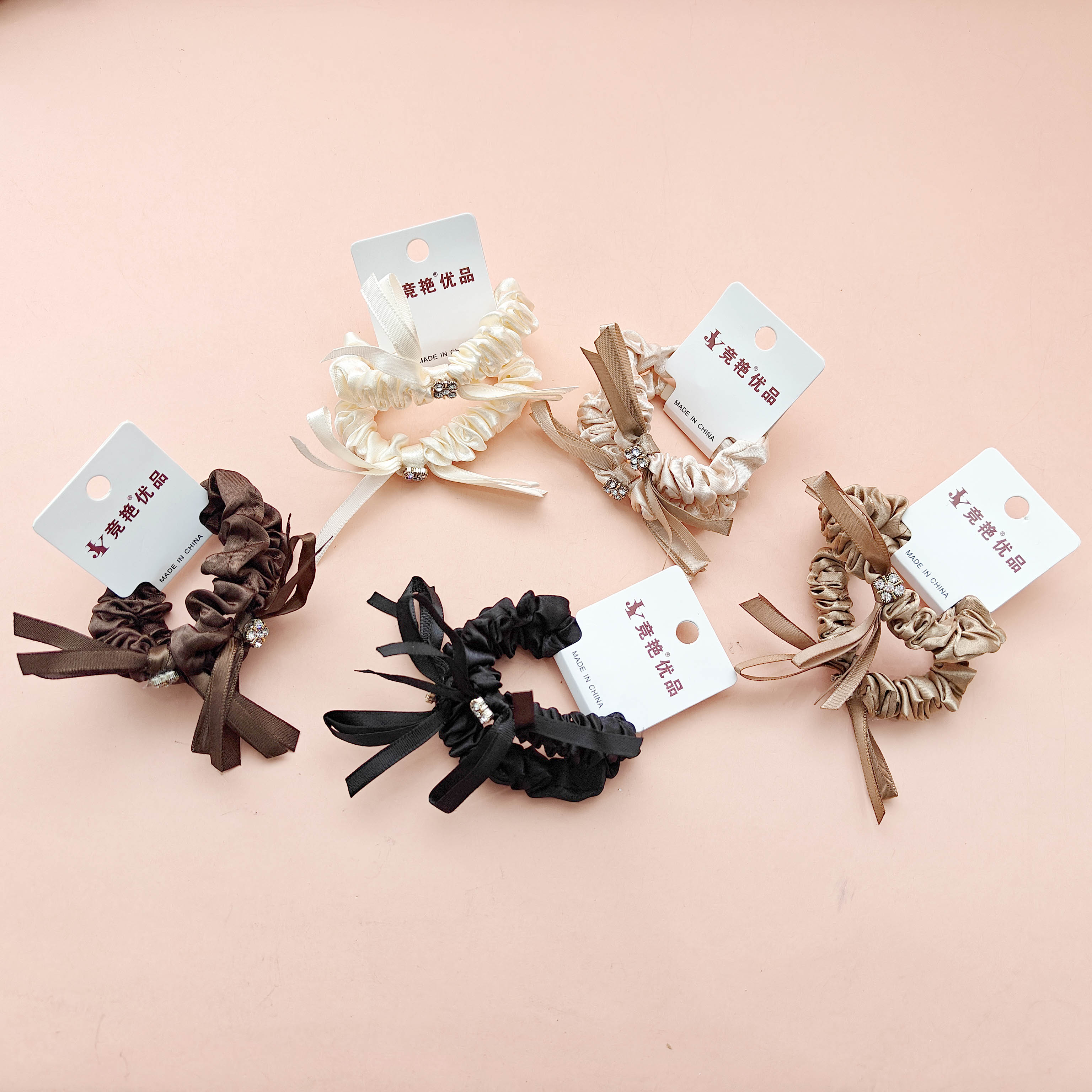 2 hairbands with butterfly bows decorated with crushed diamonds