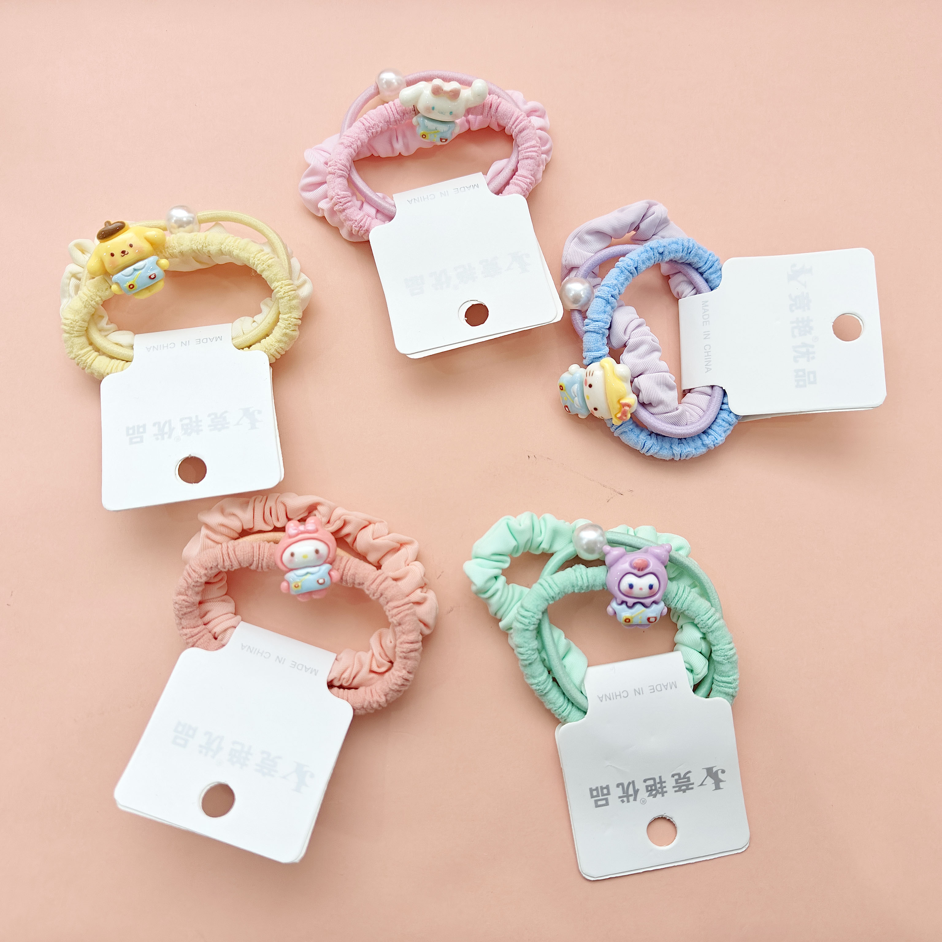3 cute cartoon-themed Instagram-style keychains with a large, round design