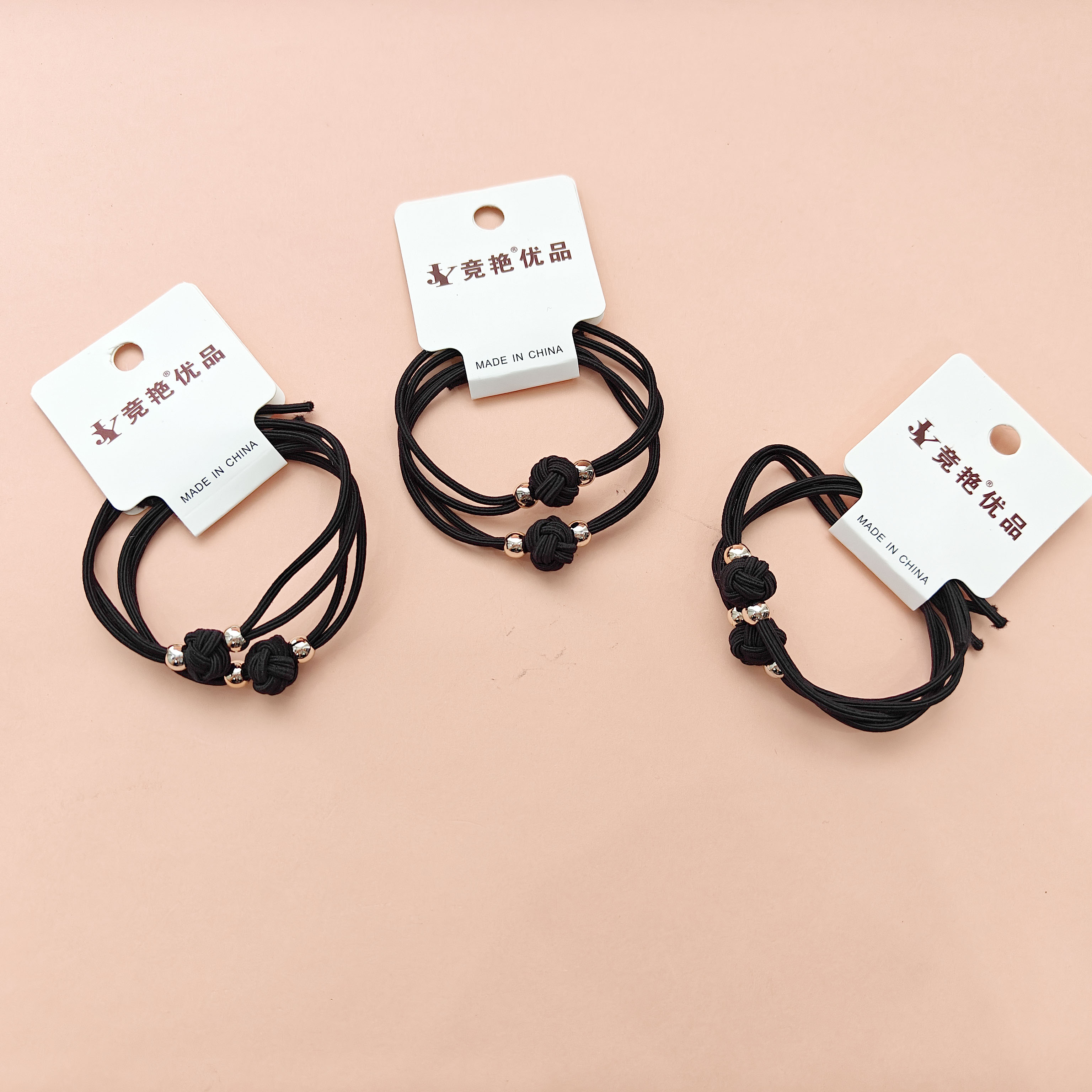 2 black lucky flower knot headbands