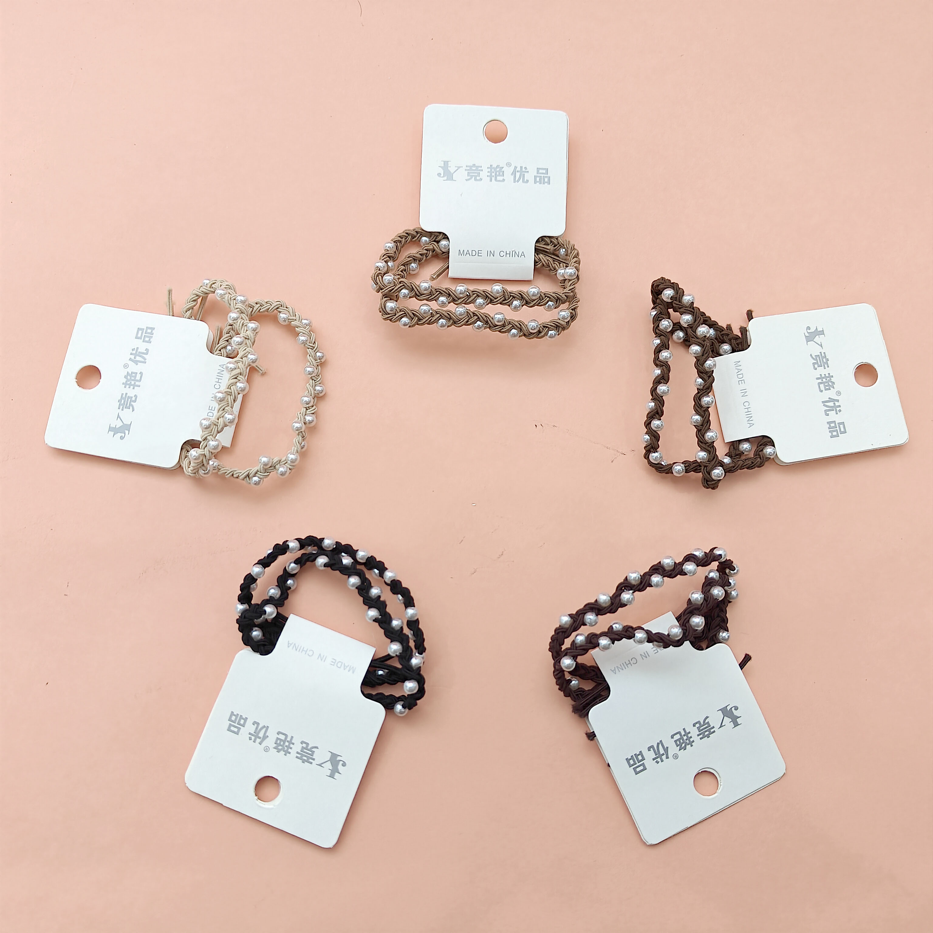 2 black elegant woven pearl hair ties