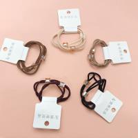 2 simple headbands decorated with black imitation crystals