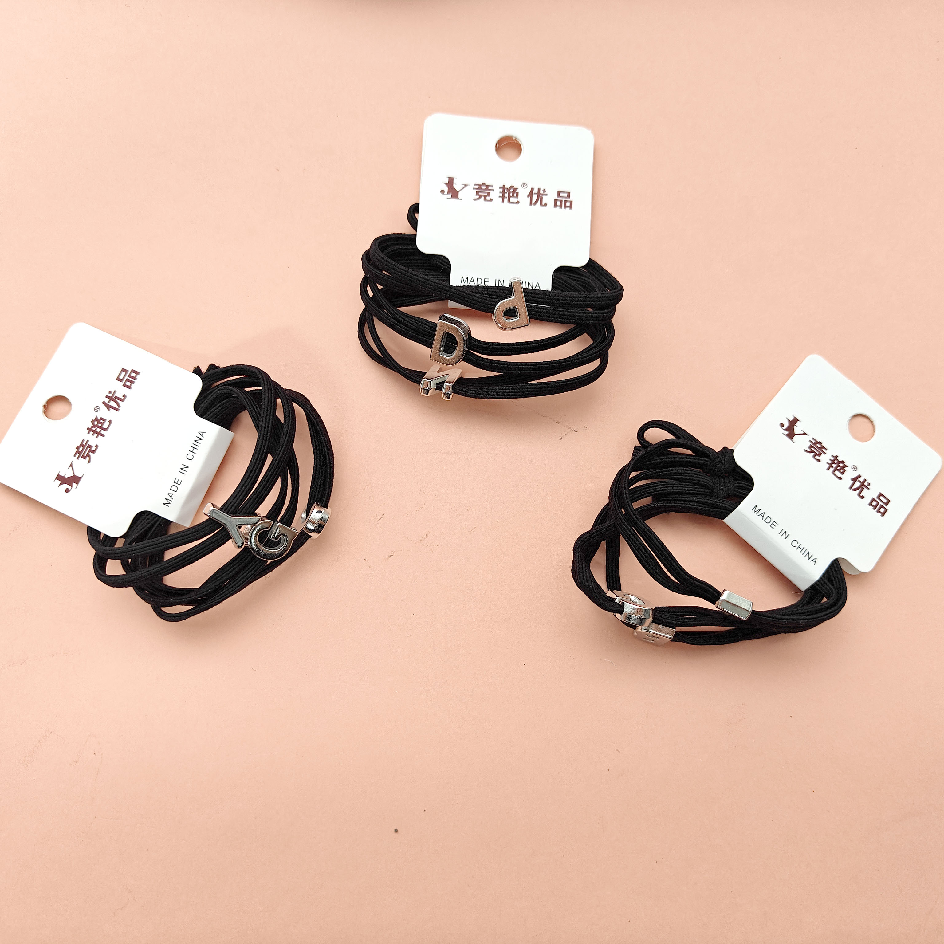 3 black laces with English letter heads