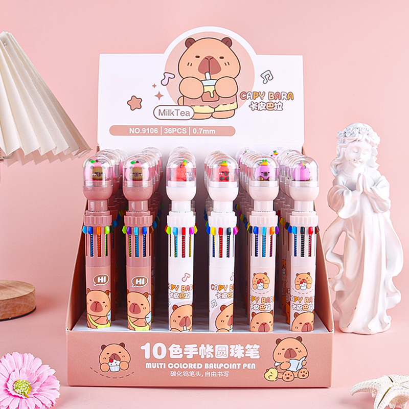 9106 10-color swatch booklet with a Kibala-themed notebook and ballpoint pen