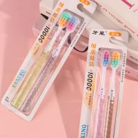 The "Tooth Star 0359A" double-packaged colorful toothbrush set contains 100 bristles.