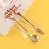 Gold-plated Christmas spoons and forks