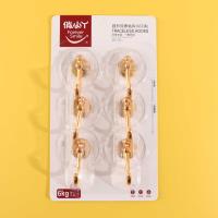 LY9297 - Six crochets adhésifs ronds en or.