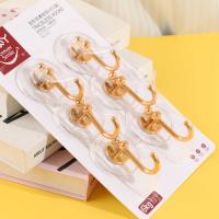 LY9297 - Six crochets adhésifs ronds en or.