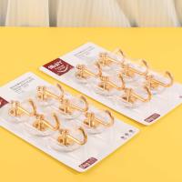 LY9297 - Six crochets adhésifs ronds en or.