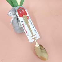 A gold-plated No.1 pointed spoon with a thick handle