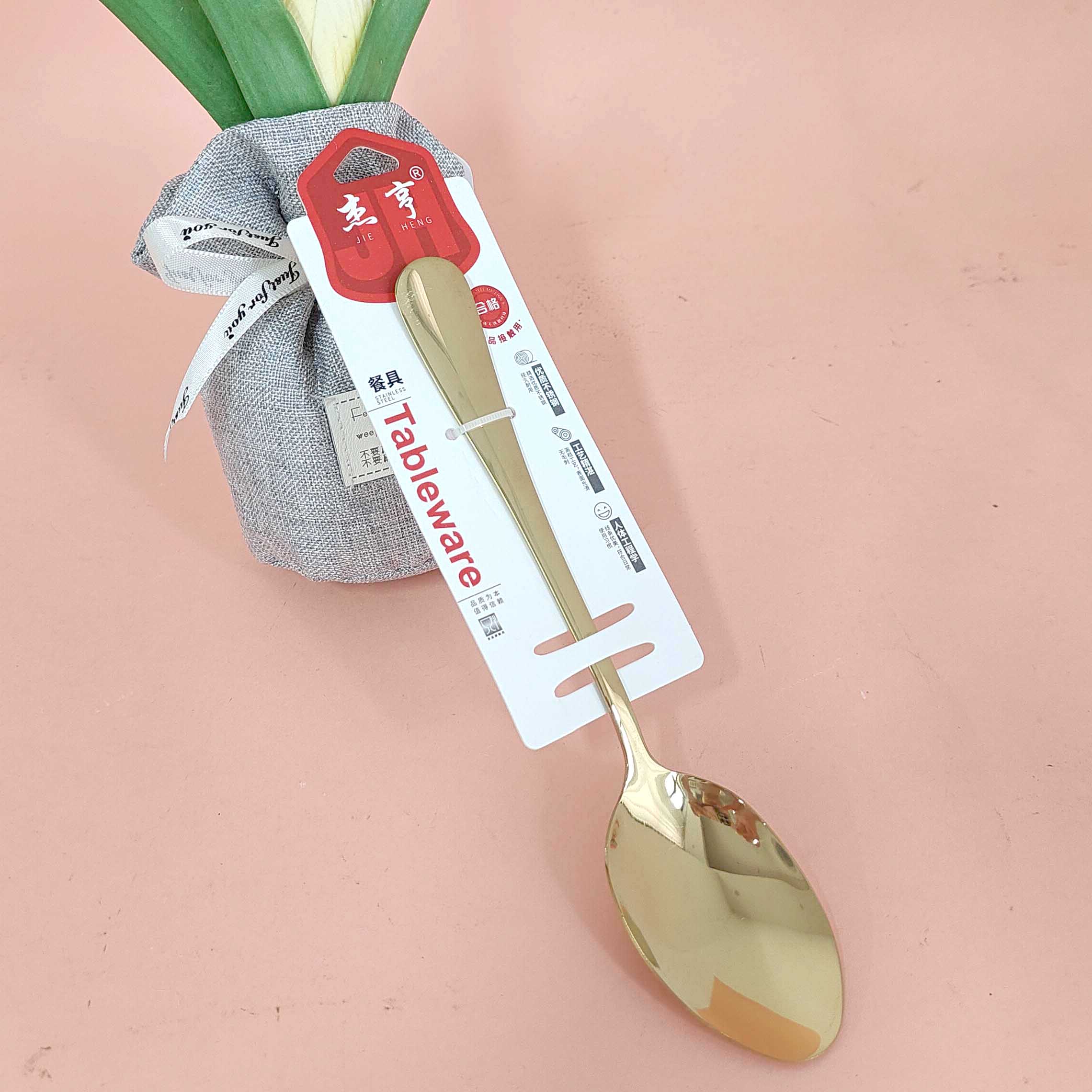 A gold-plated No.1 pointed spoon with a thick handle