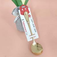 A gold-plated round spoon with a thick handle, model number 1