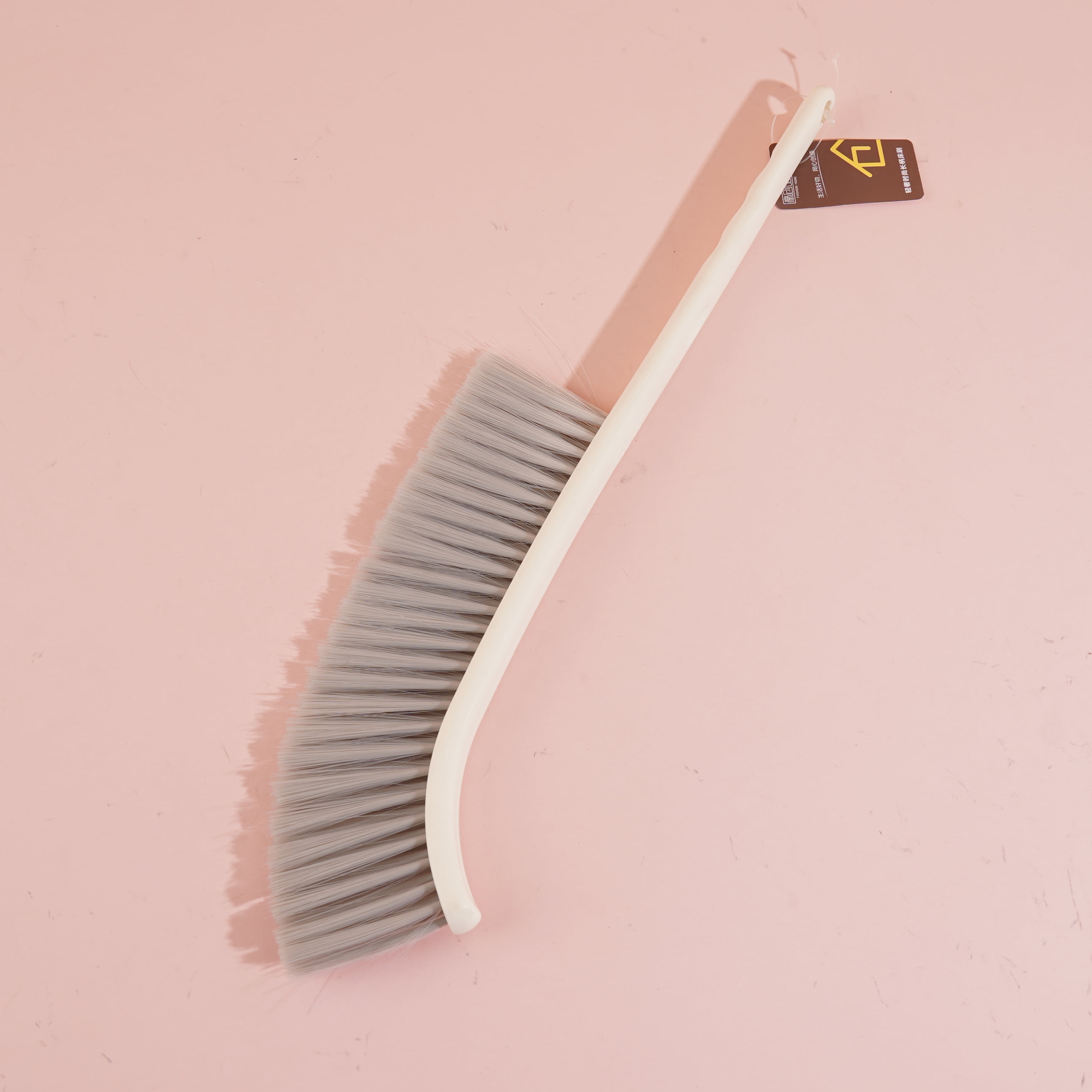 The 8306 long-handled bed brush from Light Luxury Fashion
